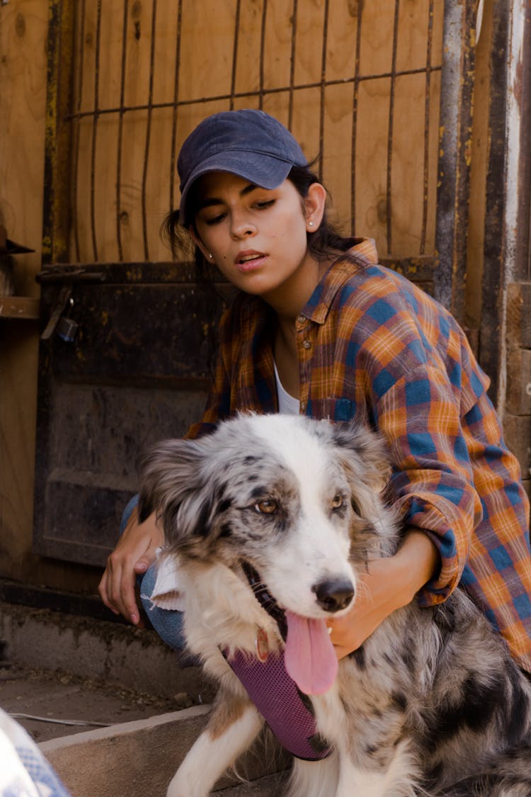 Woman Petting A Dog 