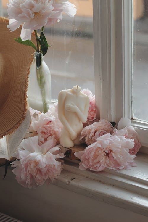 White Candle Beside the Window