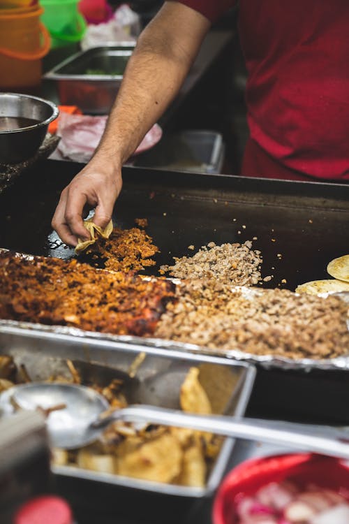 Free Cooking of Tacos on a Large Pan  Stock Photo