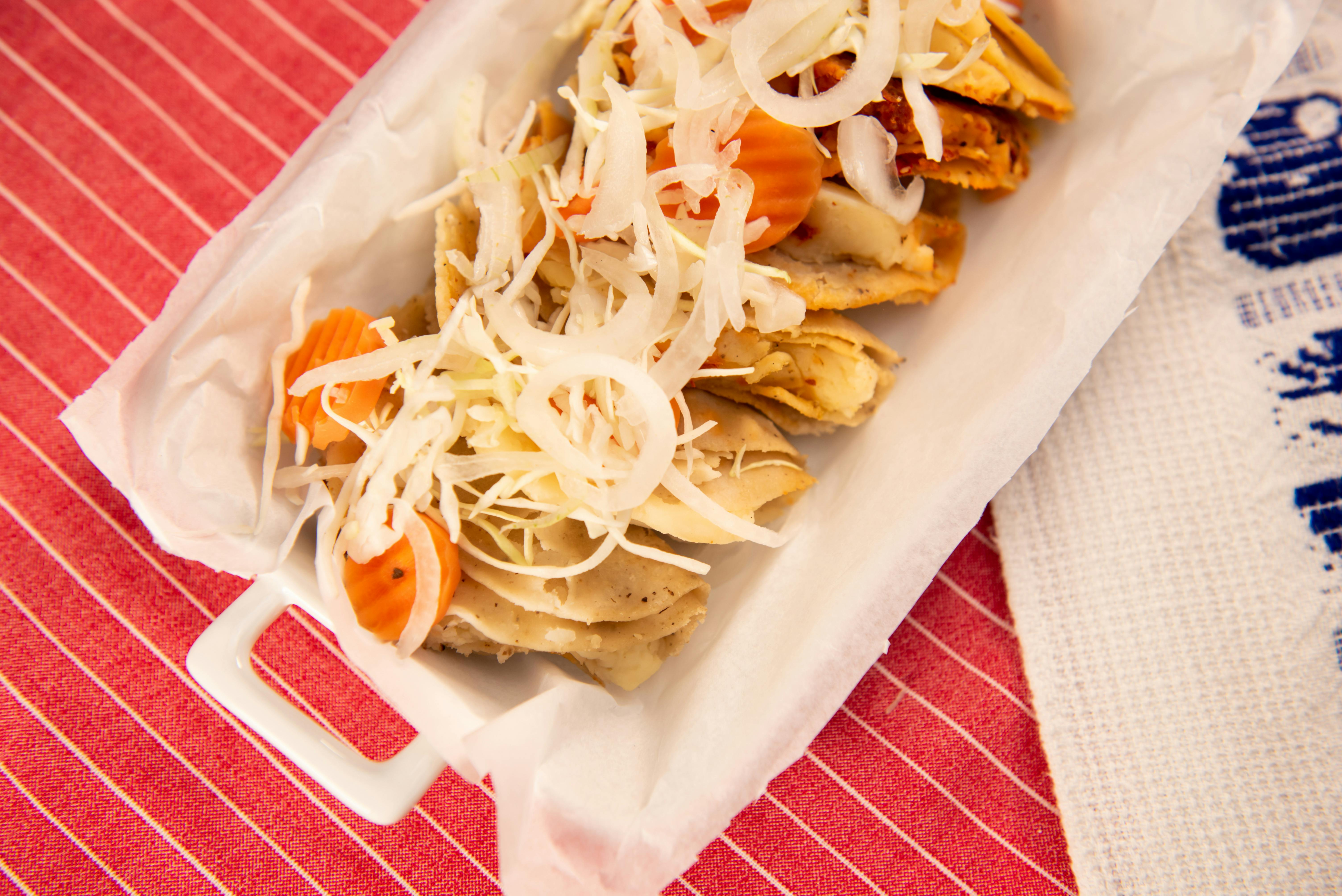 Authentic street tacos with traditional garnishes - Taco Catering