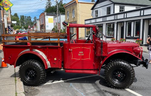 A Red Truck Parked on the Street