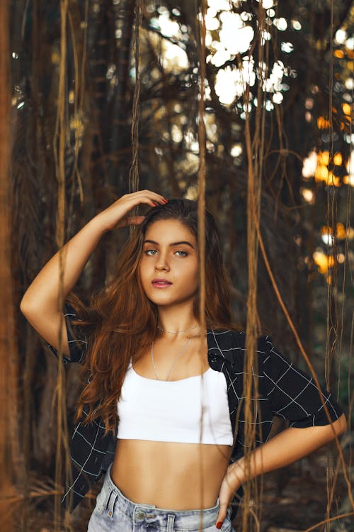 Free Woman Posing Under the Trees  Stock Photo