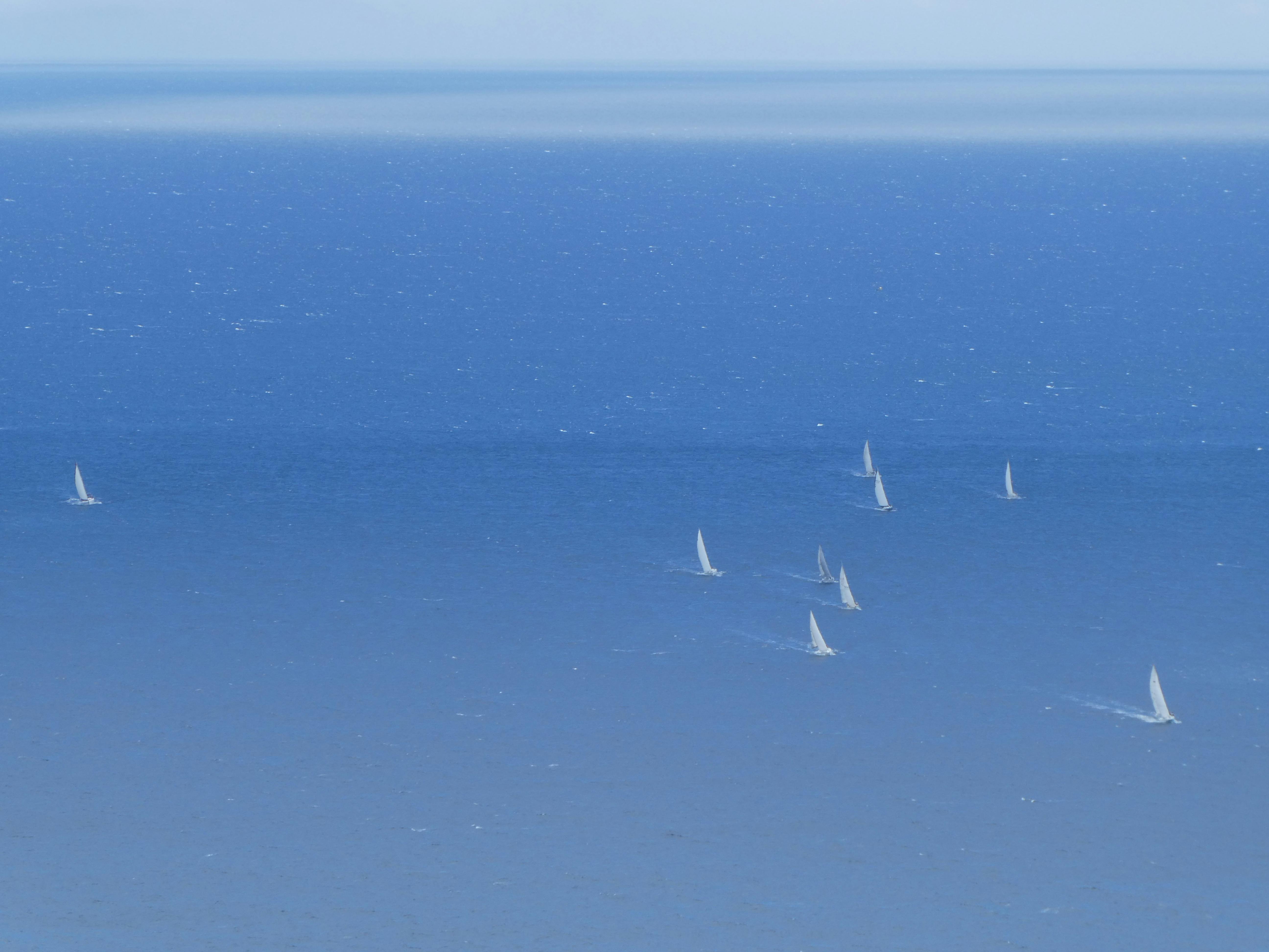 Close-up of a data center corridor with rows of servers and glowing status lights