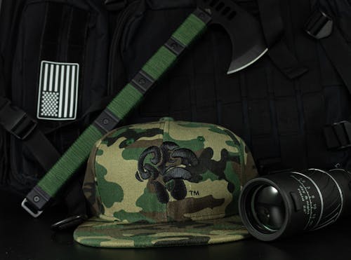 Green Camouflage Cap in Close Up Photography
