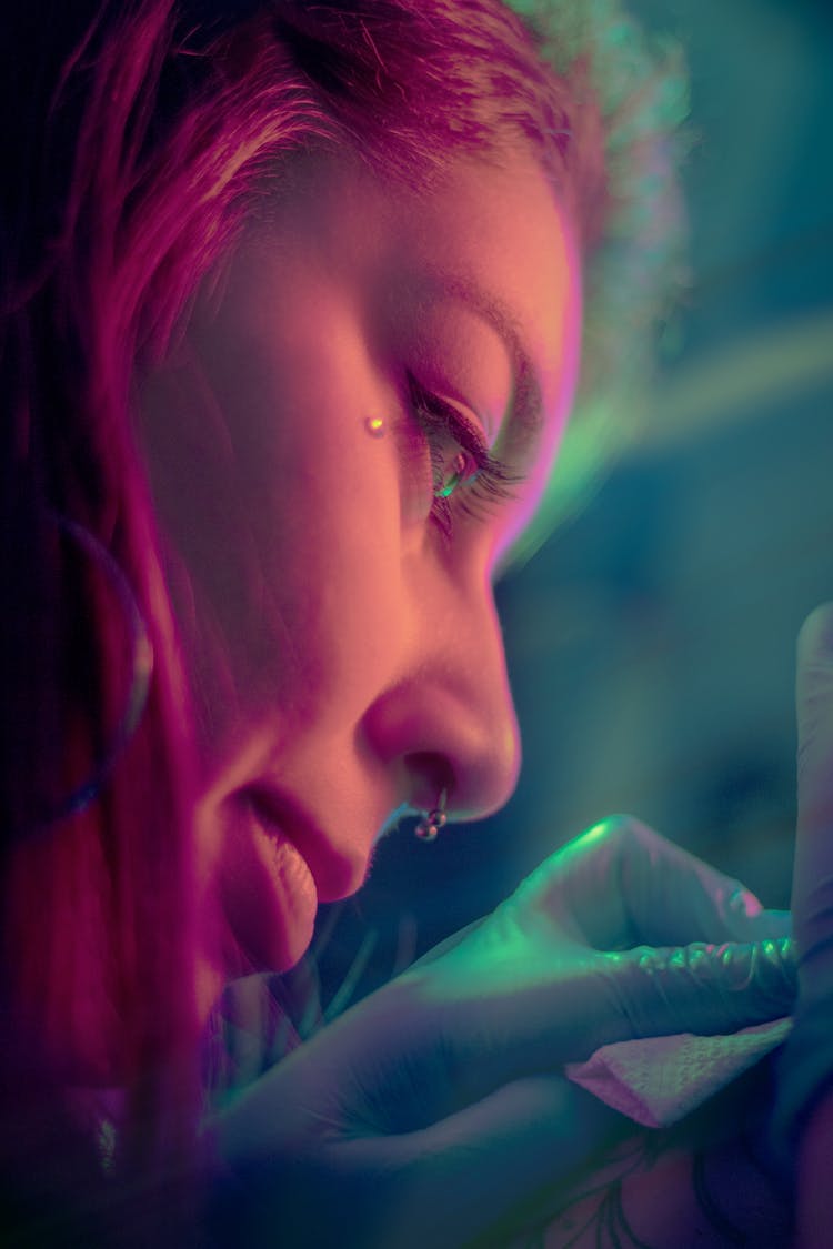 Close Up Shot Of A Woman With Nose Piercing