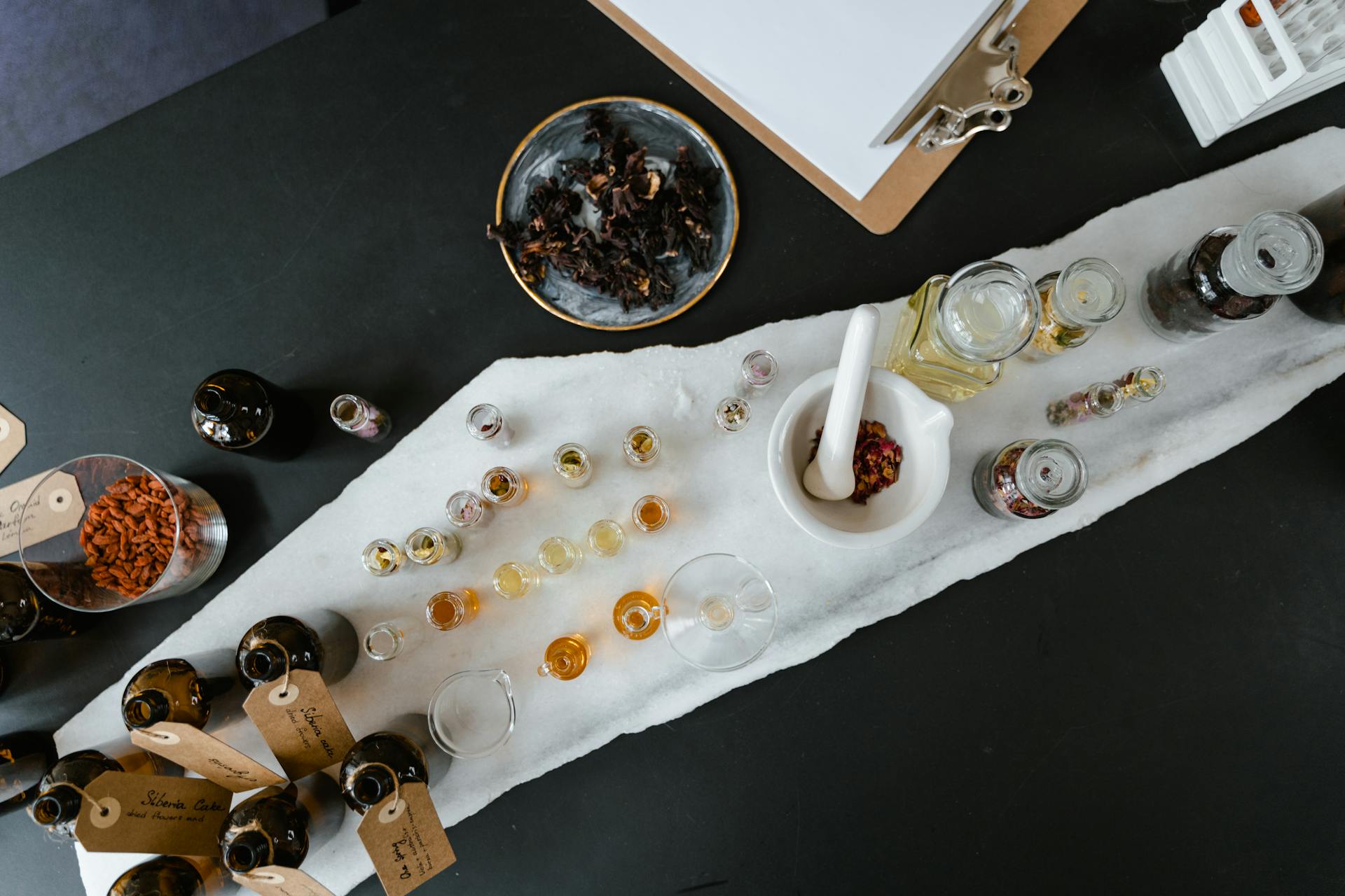 Glass Bottles with Yellow and Orange Liquid