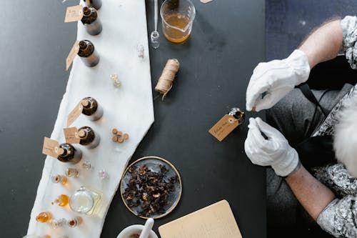 Free A Man Making Perfume Stock Photo