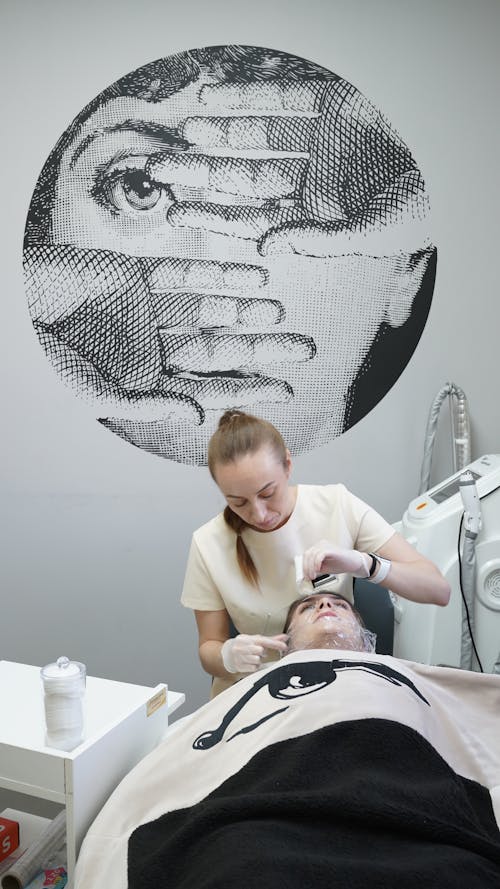 Free Woman Having a Facial Treatment Stock Photo