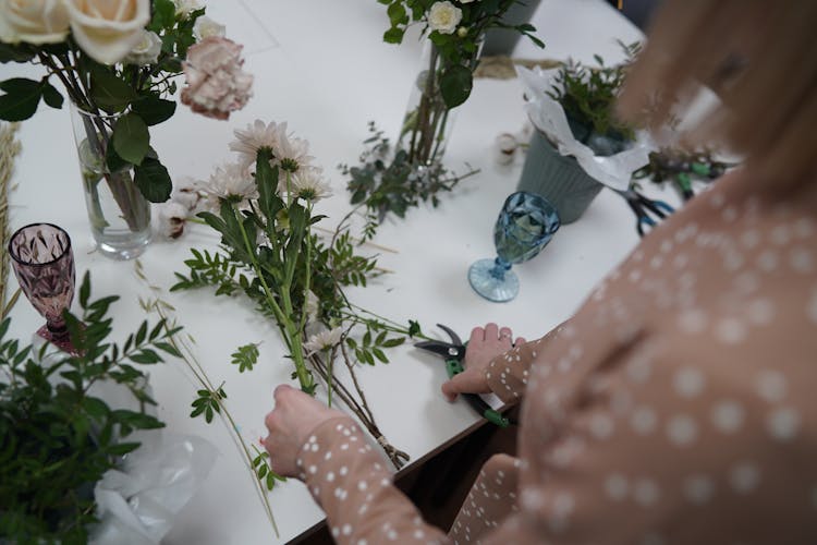 Woman Preparing Floral Arrangements