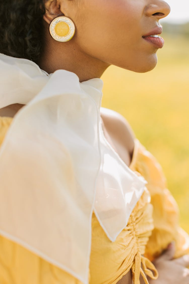 Woman Wearing Scarf And Earring