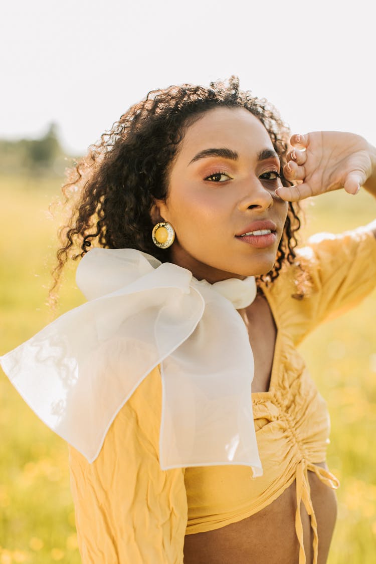 Woman In Yellow Crop Top Shirt Posing