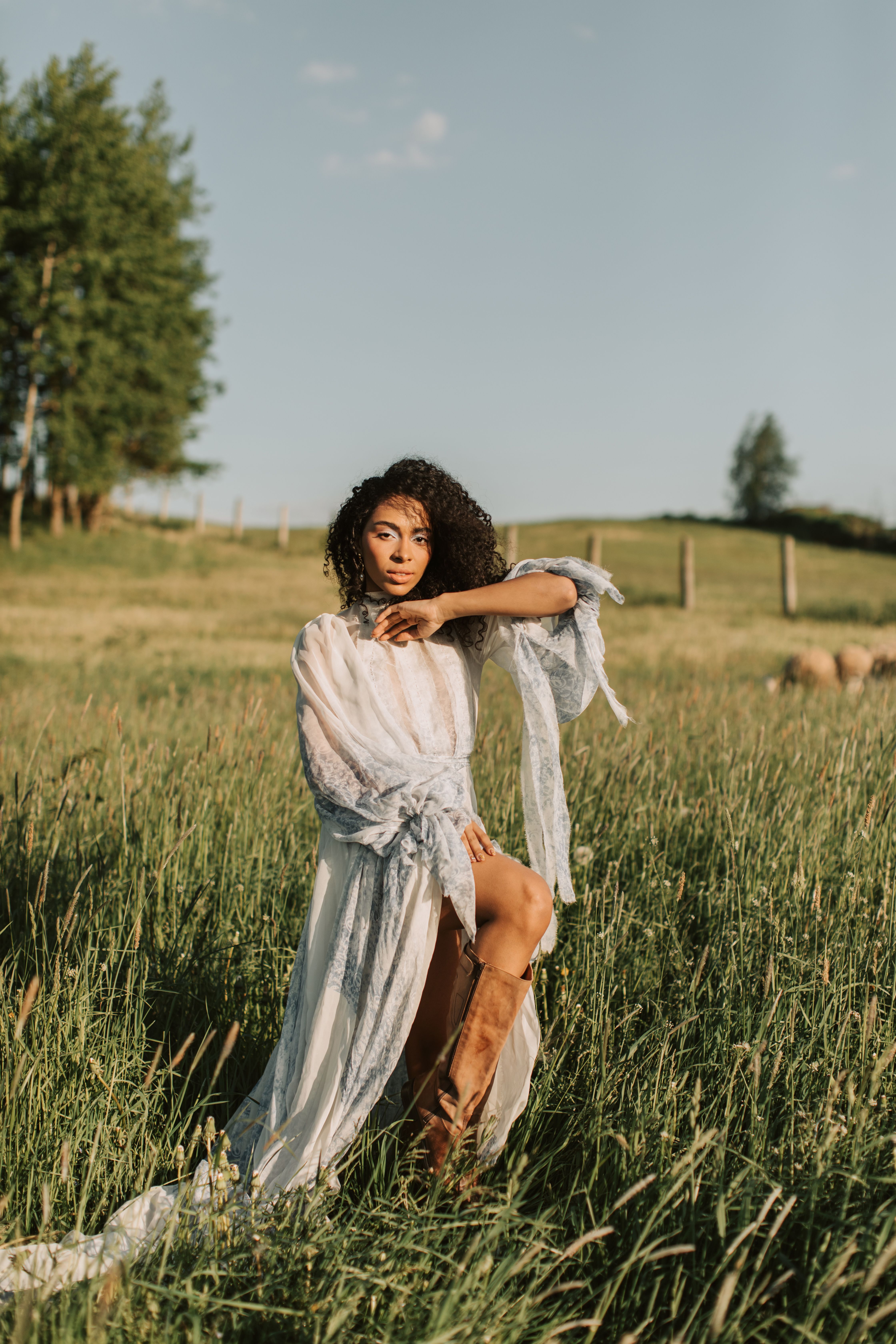 Woman in White Dress Standing on Grass Field · Free Stock Photo