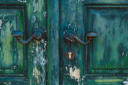 Black and Green Door with Black Door Knob