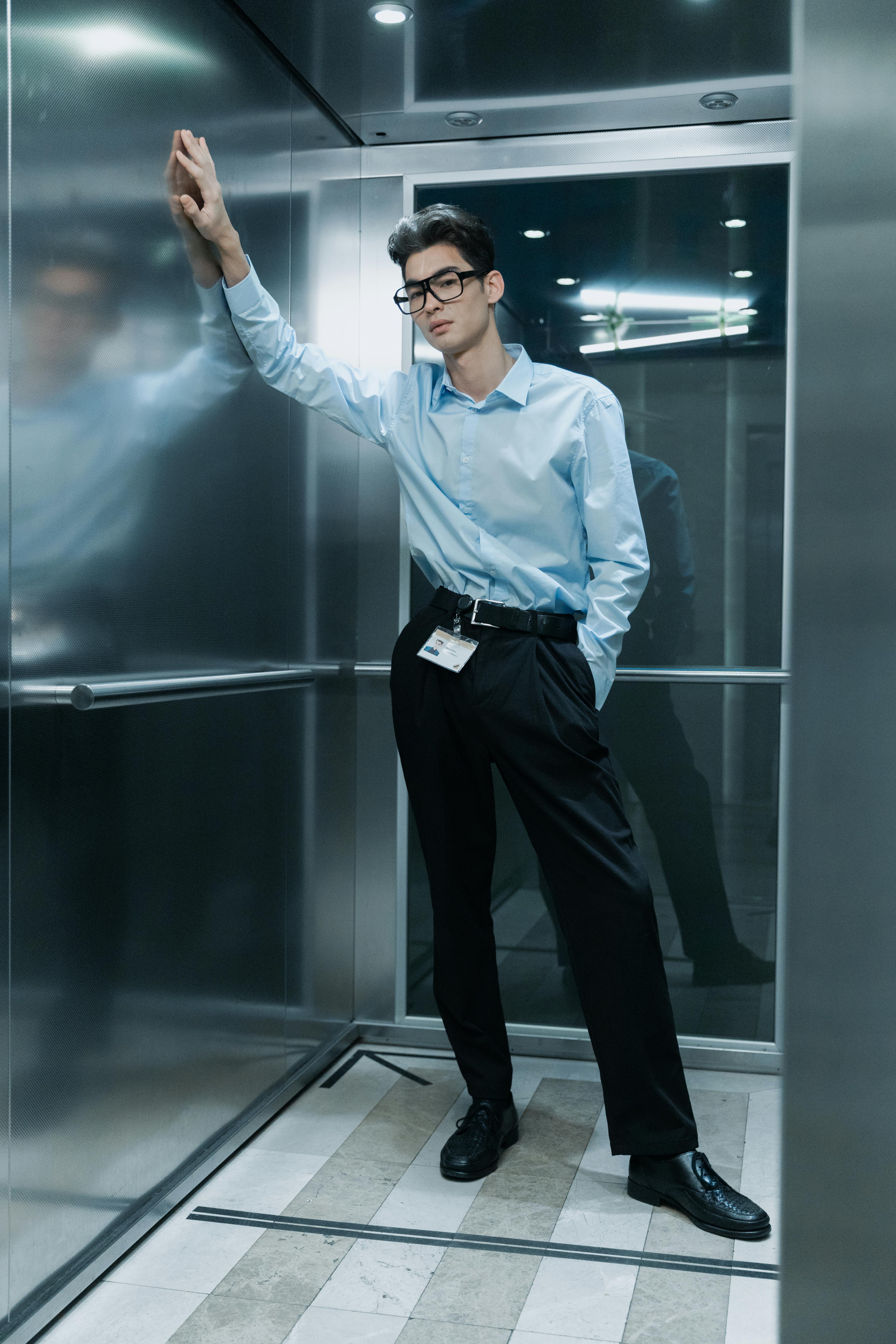 picture of girl in sunglasses posing in elevator, Stock Photo, Picture And  Low Budget Royalty Free Image. Pic. ESY-005717070 | agefotostock