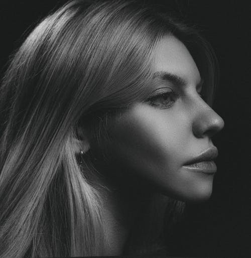 Beautiful Face of a Woman in Grayscale Photography