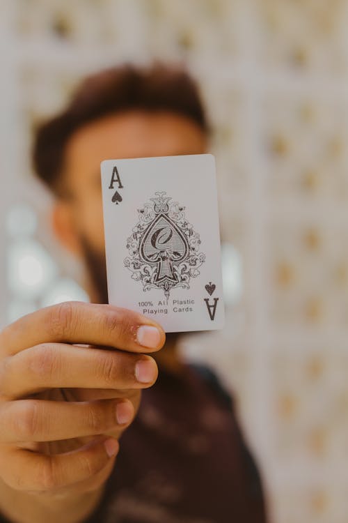 Free Person holding Ace Card Stock Photo