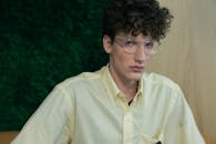 A Man Wearing a Button Down Shirt