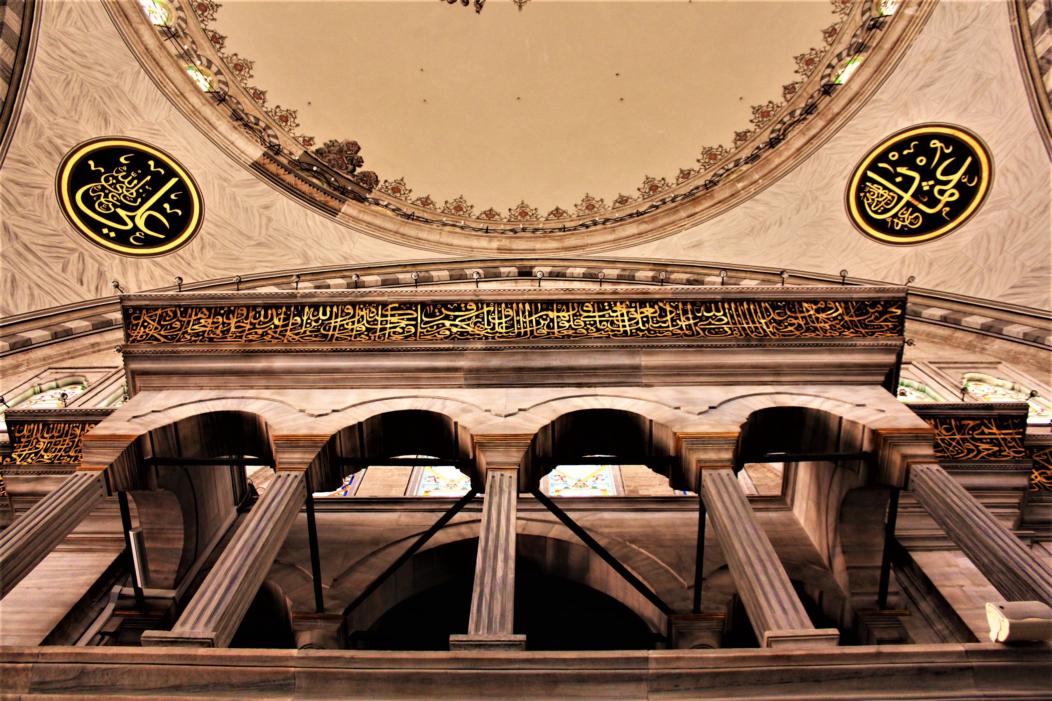 A breathtaking view of mosque interior in Istanbul, showcasing Islamic architecture and intricate calligraphy.