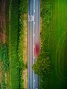 Green Grass Field on Side of the Road
