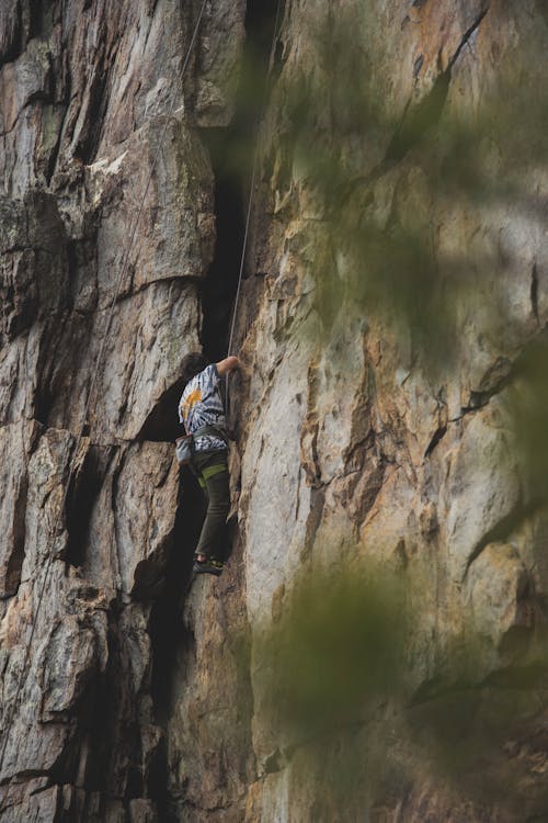 Free Man Rock Climbing Stock Photo