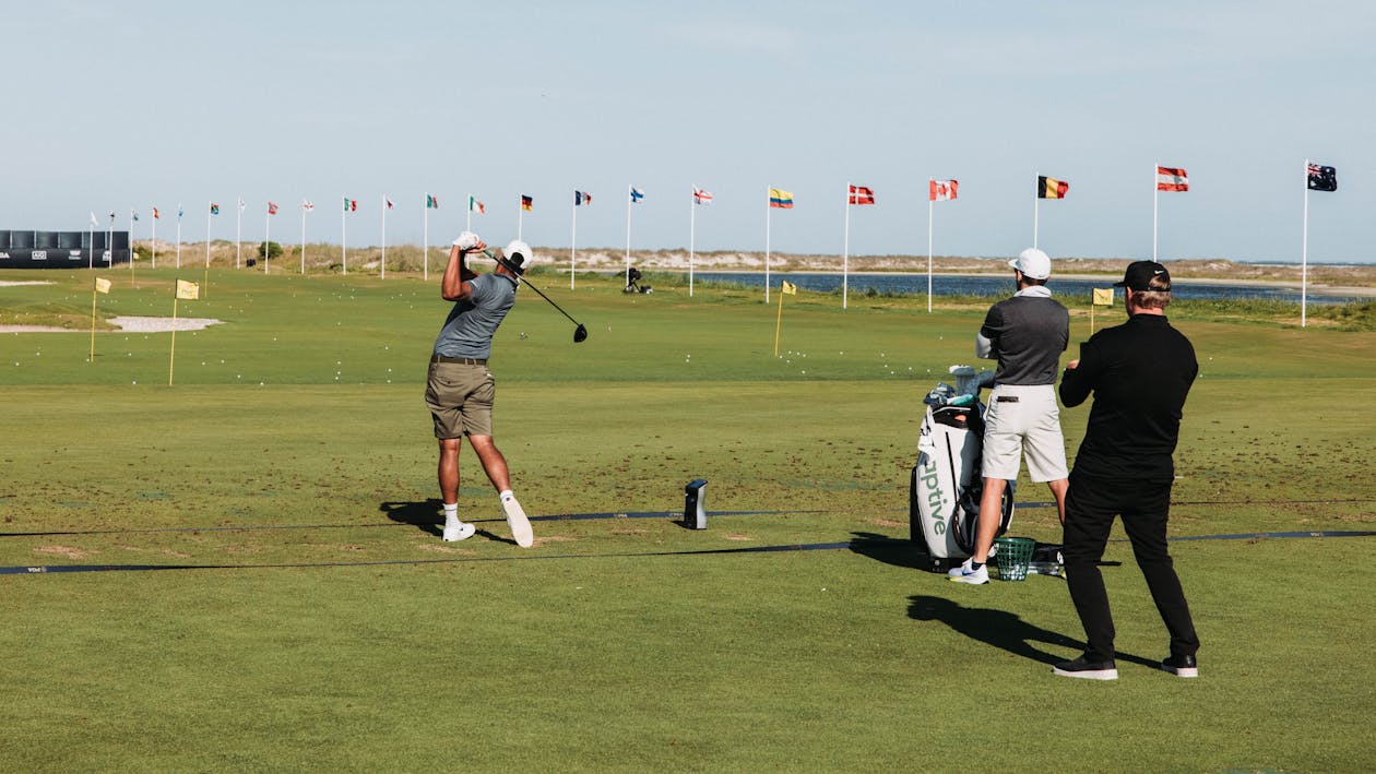 Free Men Playing Golf Stock Photo