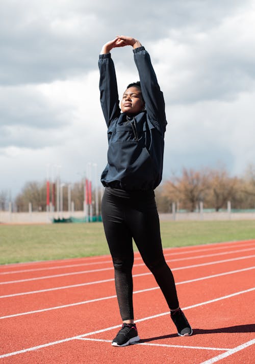 A Woman Stretching Her Arms