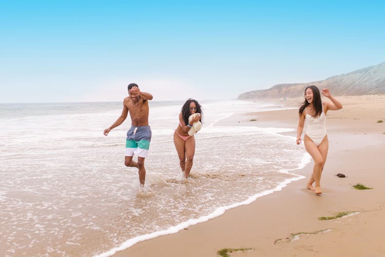 People Having Fun At The Beach