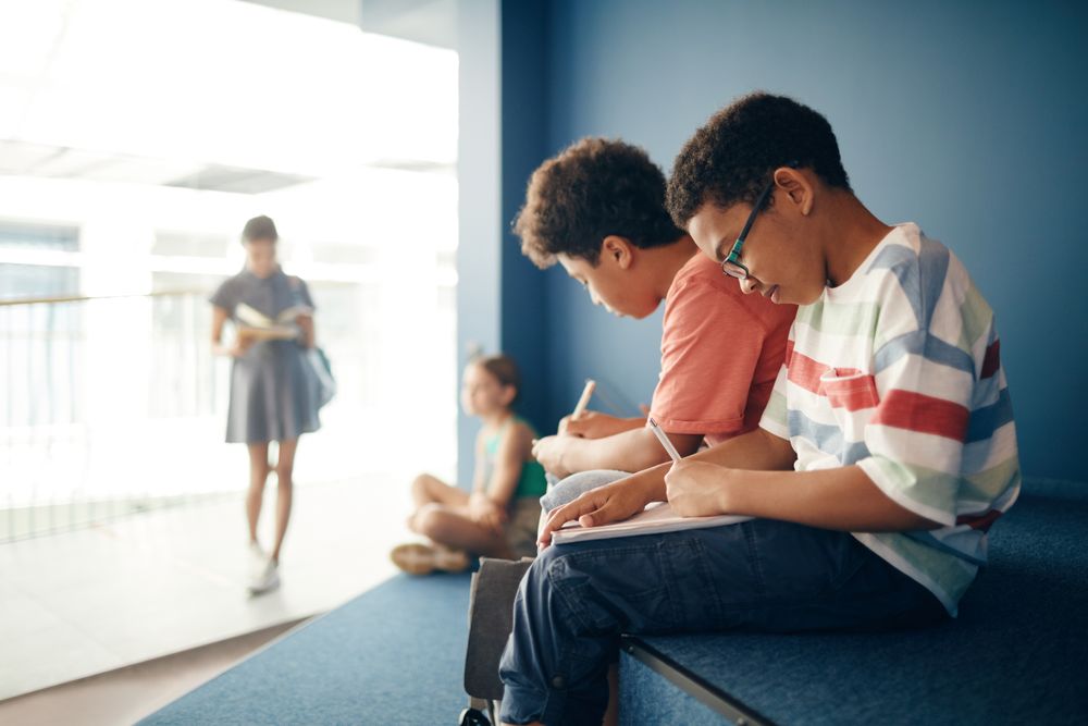 High school students learning in classroom