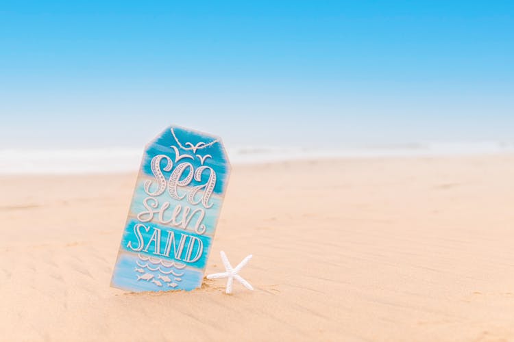 Summer Placard Sign On White Sand