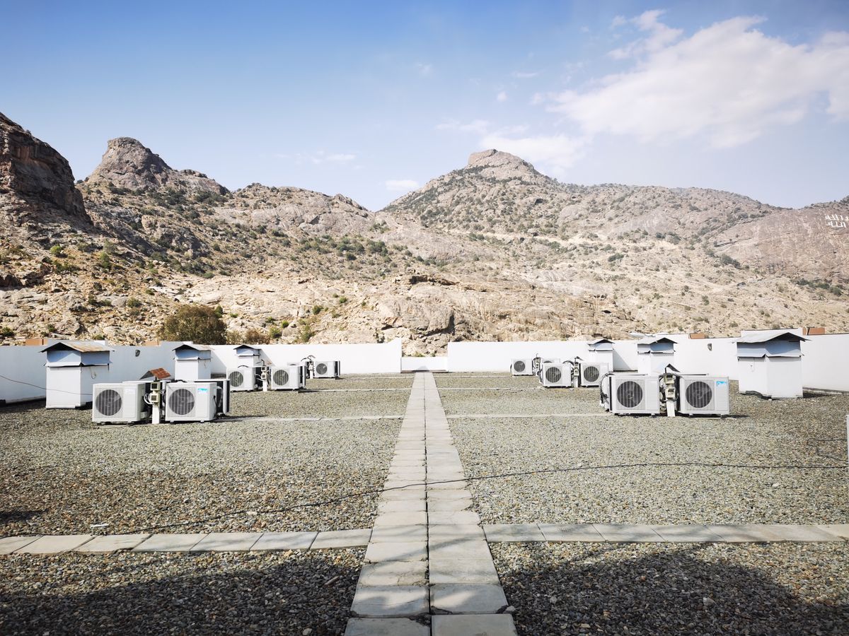 Commercial rooftop air conditioning equipment with multiple outdoor HVAC units