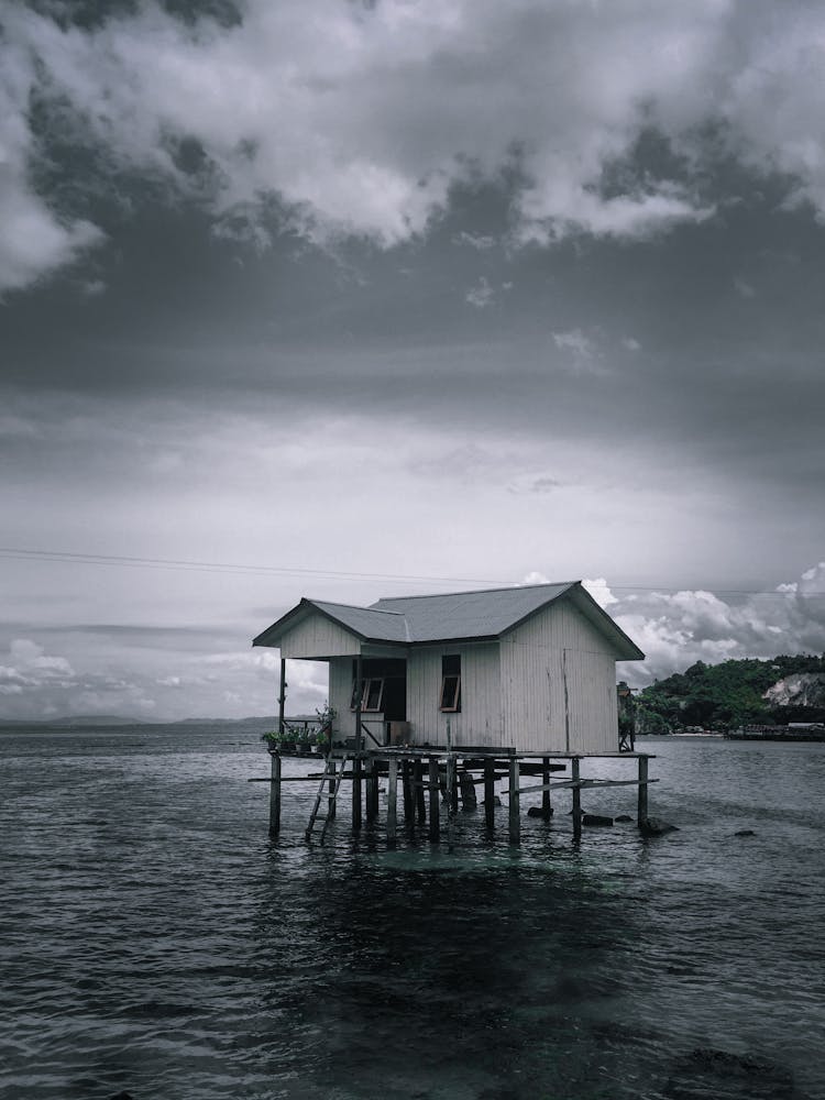 Stilt House In A Lake