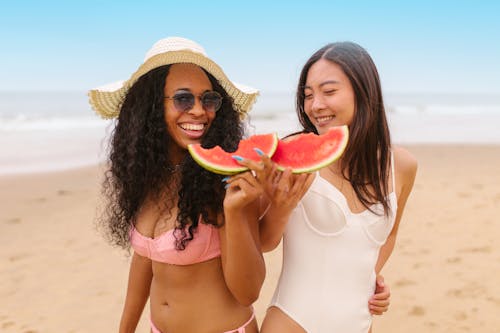 Free Woman in White Tank Top Holding Watermelon Stock Photo