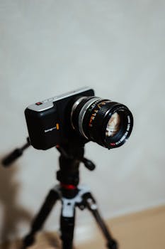 Professional camera mounted on a tripod for high-quality photography setup.