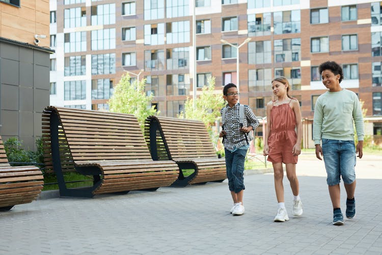 Children Walking On School Grounds