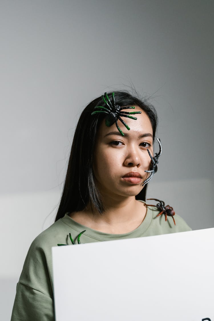 A Woman Overcoming Her Fear Of Spiders