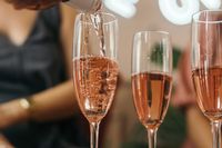 Ros&eacute; being poured into a flute — photo by Los Muertos Crew on Pexels