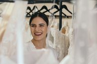 Smiling Woman in White Wedding Dress