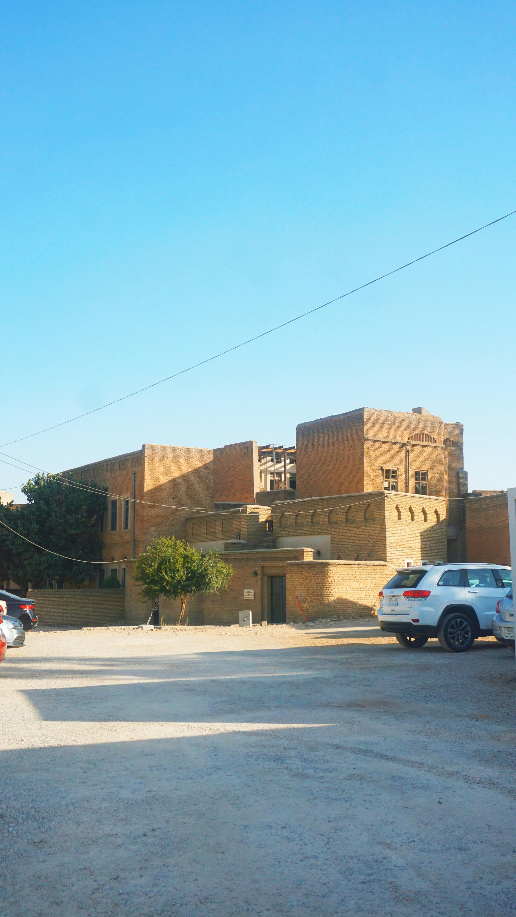Researcher working with data and code on multiple screens in a lab environment