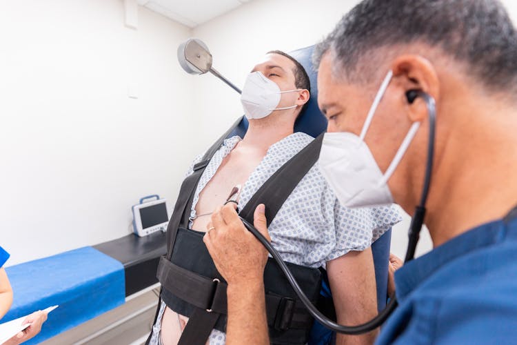 A Doctor Checking A Patient