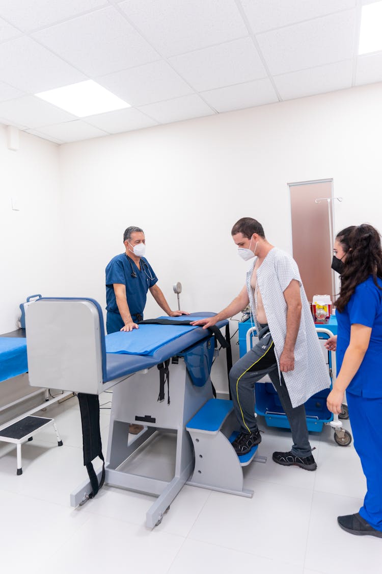 Patient And Doctors During Procedure 