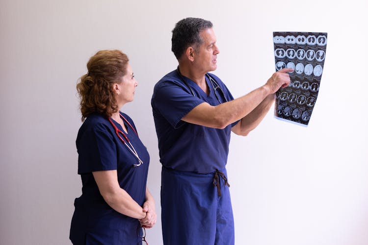 Doctors Looking At An X-ray