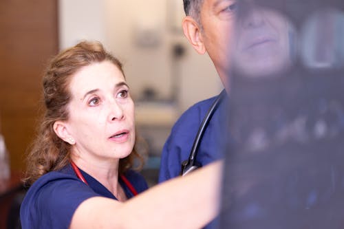 Free Doctors Looking at an X-ray Stock Photo