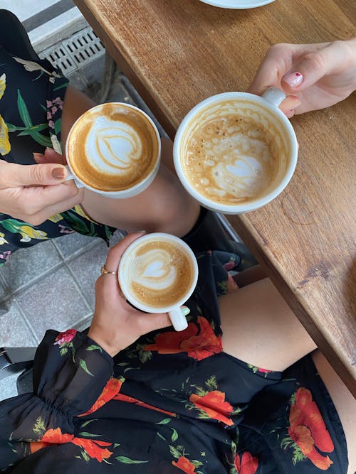 Free A People Holding Coffee Together Stock Photo