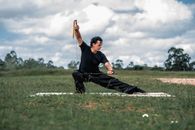 Man in Black T-shirt and Black Pants Playing Golf