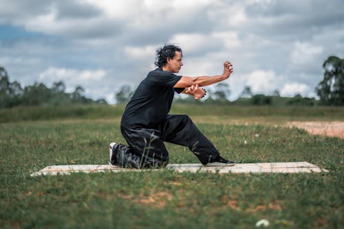 Man Practising Yoga Outdoors