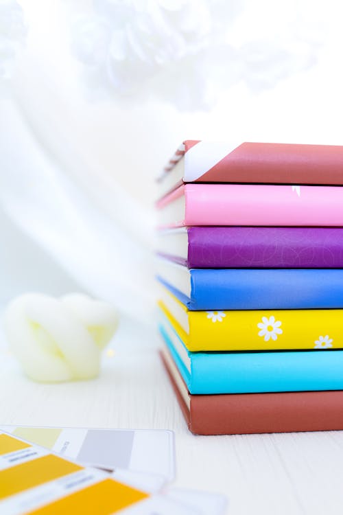 Free Stack of Colorful Notebooks Stock Photo