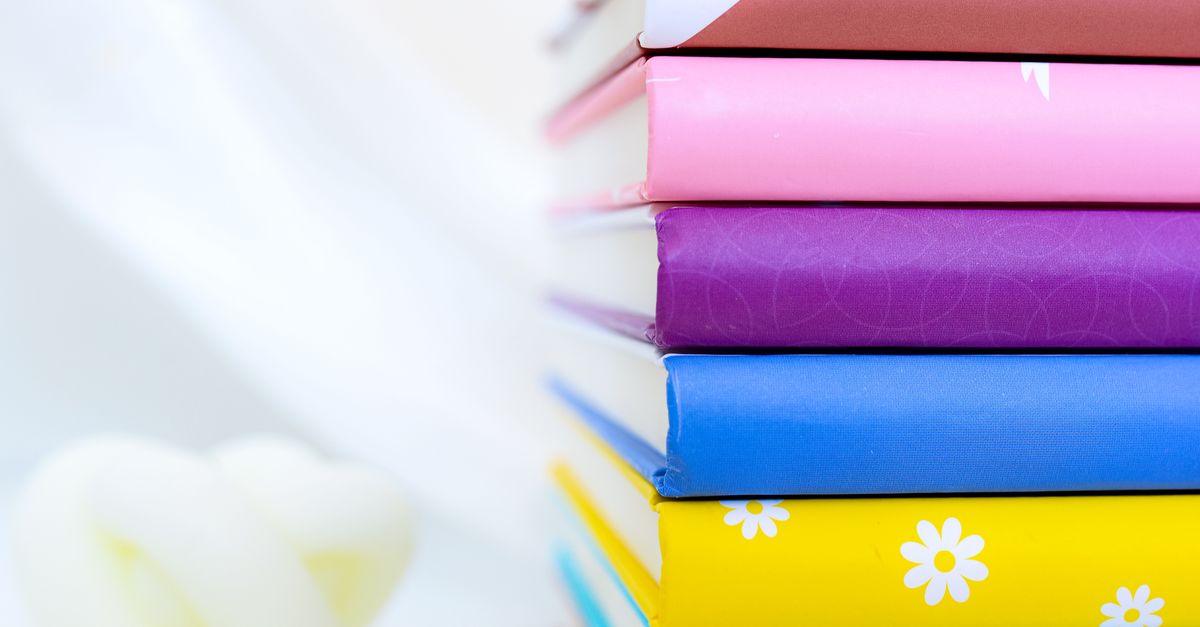 Stack of Colorful Notebooks · Free Stock Photo