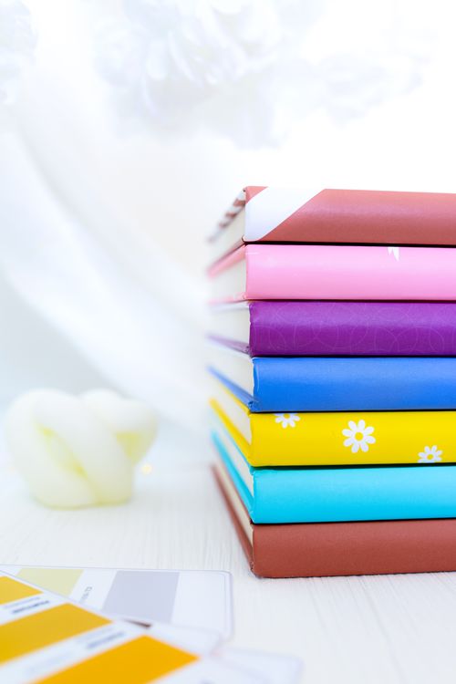 Stack of Colorful Notebooks · Free Stock Photo