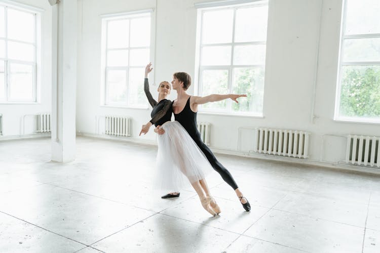 Man And Woman Practicing Ballet