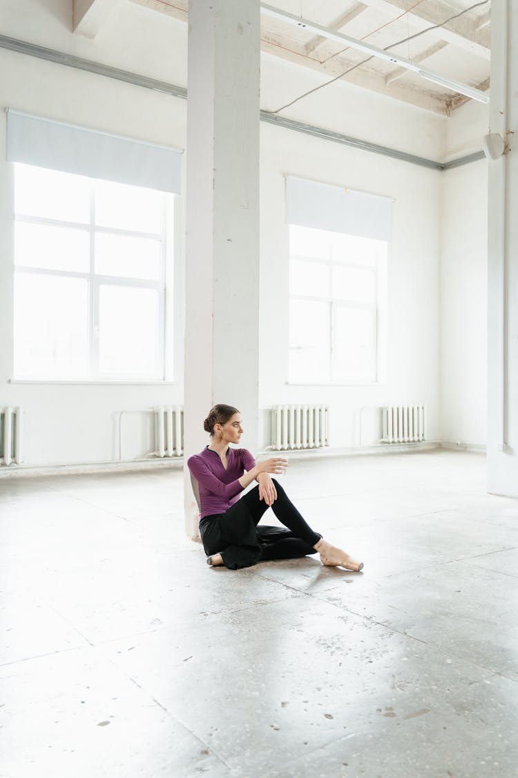 Ballerina Sitting On The Floor